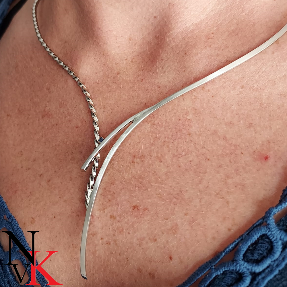 NvK Goudsemderij witgouden spang met saffier