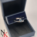 NvK Goudsmederij witgouden ring met blauwe topaas